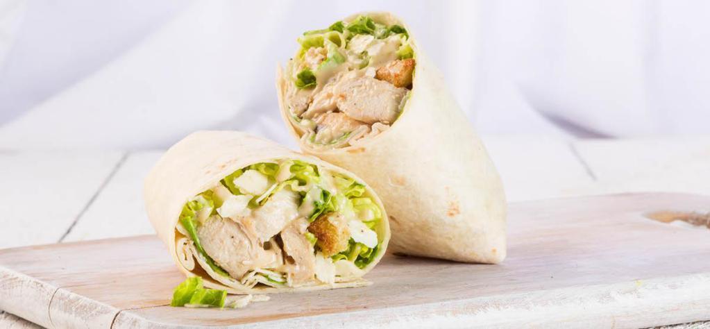 Chicken Caesar Wrap · Grilled chicken, Parmesan, romaine, housemade croutons, and Caesar dressing.