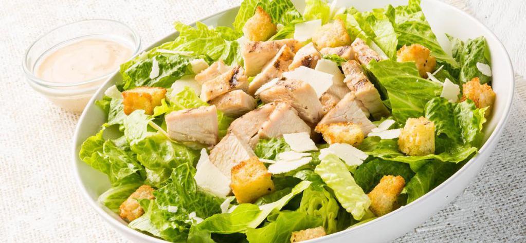 Chicken Caesar Salad · Romaine, grilled chicken, Parmesan, housemade croutons and Caesar dressing.
