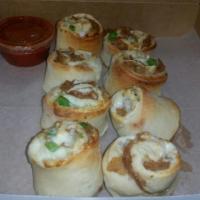 Sausage Pinwheels · Our homemade pizza dough stuffed and rolled with sausage, bell peppers and mozzarella cheese...