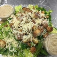 Caesar Salad · Romaine lettuce, croutons and shredded Parmesan cheese and served with Tuscan Caesar dressing.