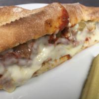 Sausage and Peppers Sandwich · Italian sausage, bell peppers, red onions, marinara and mozzarella cheese.