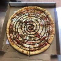 The Bronx Bomber Pizza · Sausage, roasted red peppers, fresh garlic, fresh mozzarella cheese and finished with a bals...