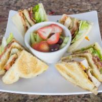 12. Chicken Club Sandwich Lunch · Triple decker of bread of your choice, chicken breast, pesto mayo, tomato, lettuce, cheddar ...