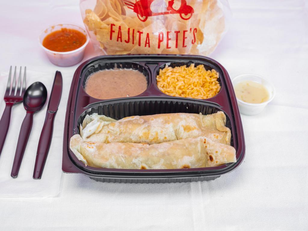 Tacos Al Carbon · Two tortillas filled with chicken or beef fajita. Served with rice, beans, and a side of queso.