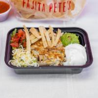 Fajita Salad · Fajita chicken or beef on a bed of lettuce and topped with shredded cheese, guacamole, sour ...