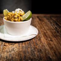 Esquites · Corn off the cob with Tajin mayonnaise and queso fresco.