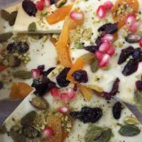 White Chocolate Bark  · With apricot, pistachios and cranberry. 