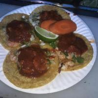 Tacos · Choice of meat onions cilantro hot or mild sauce