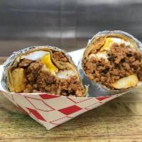 The Chori-Man Breakfast Burrito (Burrito con Papas) · The Chori-Man Breakfast Burrito. Choice of meat with diced Russet potatoes, 2 eggs and chees...