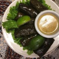 Dolmas Appetizer · Stuffed grape leaves with rice and herbs. Served chilled.