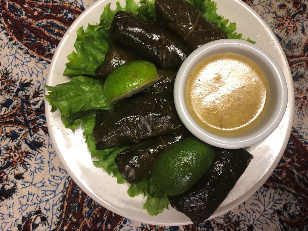 Dolmas Appetizer · Stuffed grape leaves with rice and herbs. Served chilled.