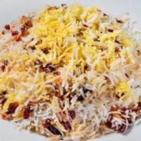 Zereshk Polow · Celebration rice. Basmati rice, barberries, slivered almonds, and saffron.
