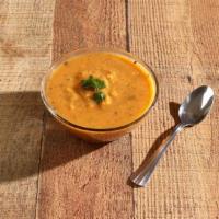 Lentil Soup · Delicious and thick soup based on red and yellow lentils with a hint of garlic.