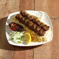 Koobideh Kebab Entrée · 2 skewers of lean ground beef marinated with saffron and special house seasoning. Served wit...