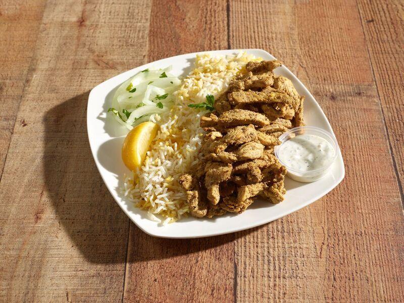 Chicken Shawarma Entrée · Strips of chicken breast marinated with house special seasoning. Served with basmati rice and tzatziki sauce.