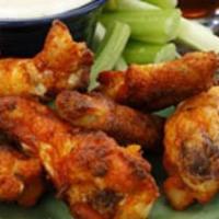 Buffalo Wings (Bone In) · Spicy buffalo flavor only. Choice of ranch or blue cheese. Served with carrot sticks and cel...