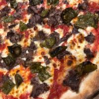 The Philly Special Pizza · Organic San Marzano tomatoes, mozzarella, grass fed rib eye and long hots.