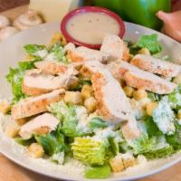 Chicken Caesar Salad · Romaine lettuce, croutons, Parmesan cheese and Caesar dressing. 
