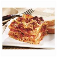 Baked Lasagna · Layered lasagna noodles with 1 layer of seasoned ground beef and 1 layer of ricotta, topped ...