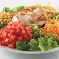 Power Greens Shrimp Caesar Salad · Power greens blend of baby kale, arugula, & spinach, garlic roasted shrimp, Parmesan, house-...