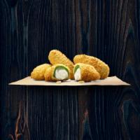 Jalapeno Poppers · Cream cheese, breaded stuffed jalapenos and the original poppers.