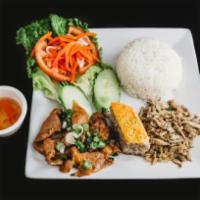 C2. Grilled Pork, Shredded Pork and Meatloaf Rice Dish · Served with green onion oil, fish sauce and white rice.