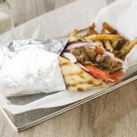Sliced Beef and Lamb · Yeero on pita bread with tzatziki sauce, onions and tomatoes. Served with side of fries.