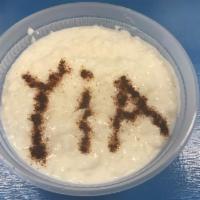 Rice Pudding · Traditional Greek, creamy rice pudding topped with freshly ground cinnamon.