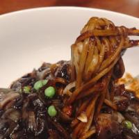 Jia Jang Mein 짜장면 · Black bean sauce noodles. Contains Pork