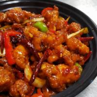 Kung Pao Chicken · Deep-fried chicken breast stir-fried w/ bell peppers and NUTS