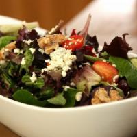 Compo Salad · Baby field greens and grape tomatoes with dried cranberries, Gorgonzola, and glazed walnuts.