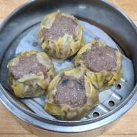 4. Beef Shiu Mai (4 pieces) · Steamed minced beef wrapped in wonton skin.