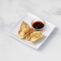 Pot Stickers · Served with choice of meat or vegetable.