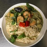 Seafood Green Curry with Soybean Noodles · Coconut green curry with prawns, mussels, calamari, salmon, and fish ball.