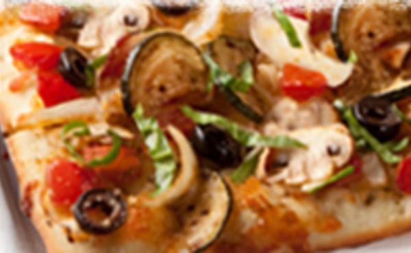 Roasted Veggies & Mozzarella Flatbread · Fresh mozzarella, mushrooms, tomatoes, onions, zucchini, black olives, garlic and Parmesan-Romano blend.