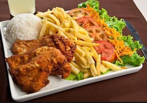 19. Frango a Milanesa · Breaded chicken. marinade chicken served with White Rice, Black Beans, and 1 side option.