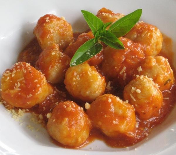 22. Nhoque Recheado · Stuffed gnocchi. A combination of Flour, Milk, oil, and salt cooked with tomato Sauce . Stuffing; Mozzarella and basil blended together.