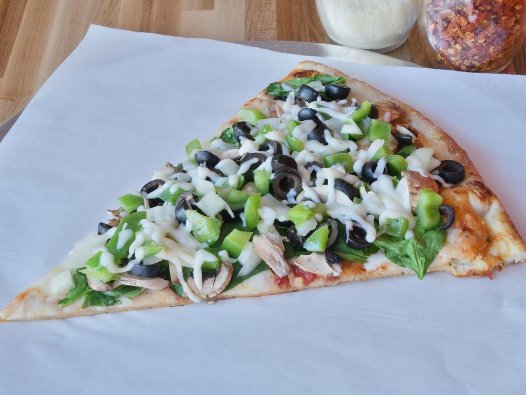Veggie Pizza Slice · Spinach, mushroom, onion, green pepper and black olive.