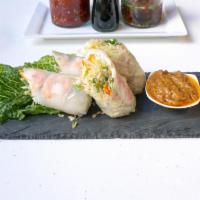 Fresh Roll Shrimp · Fresh rice paper filled with shrimp, green leaves, carrot, bean sprout, basil, cilantro and ...