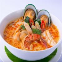 Spicy Seafood Soup · Fish fillet, green mussels, shrimp, and Thai-style lemongrass broth. Spicy.