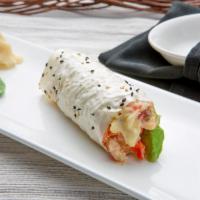 Baked Crab Hand Roll · With avocado and spicy mayo wrapped with soy paper. Spicy.