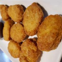Chicken Nuggets · Crisp battered nuggets served with your choice of dipping sauce