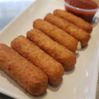 Mozzarella Sticks · Buffalo mozzarella dipped in batter, served with marinara sauce.