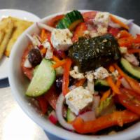 Greek Salad · Romaine lettuce , tomato, cucumber, red onion, pepper, carrots, radish, olives, feta cheese ...