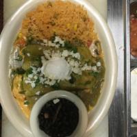 Enchiladas Guadalajara · 2 corn tortillas filled with sauteed mushrooms, corn, pico de gallo, fresh spinach, and chic...