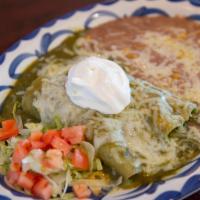 Spinach Enchiladas · 2 corn tortillas stuffed with sauteed spinach, mushrooms and onions, light cream sauce. Cove...