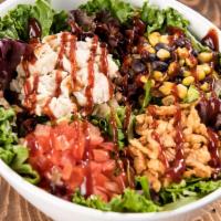BBQ Chicken Salad · Premium grilled chicken breast, mixed greens crispy cheddar onions, diced tomatoes, corn & b...