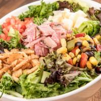Cap's Creation Salad · Garden salad with mixed greens and your choice of toppings.