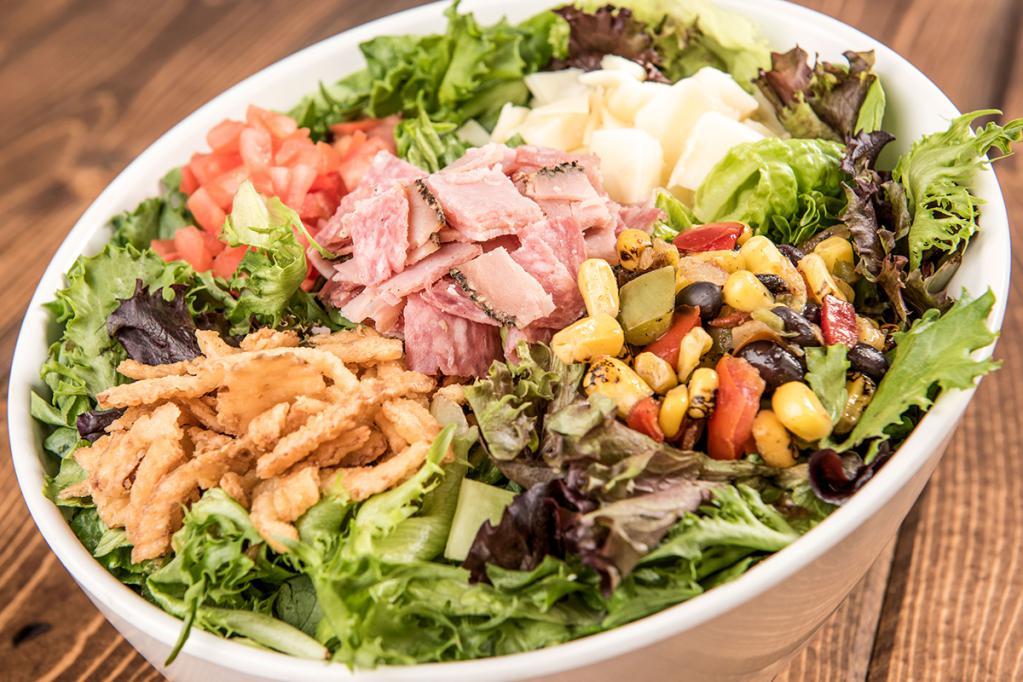 Cap's Creation Salad · Garden salad with mixed greens and your choice of toppings.