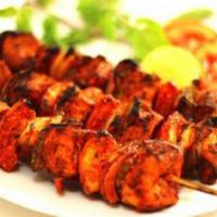 Chicken Tikka · Boneless chicken pieces marinated in aromatic spices and cooked in the tandoor.